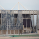 Tapestries created by local artist Adriano Varejão hang in tatters outside of the Olympic Aquatic stadium (Image: AP)